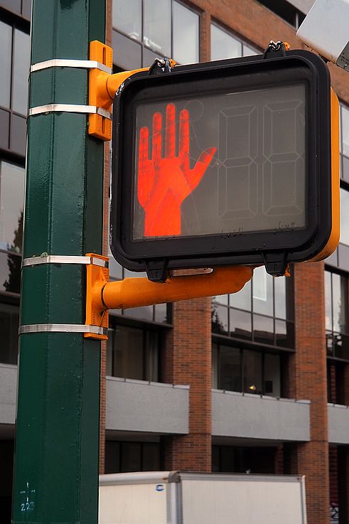Illuminated pedestrian signal in the Gastown district, Vancouver.