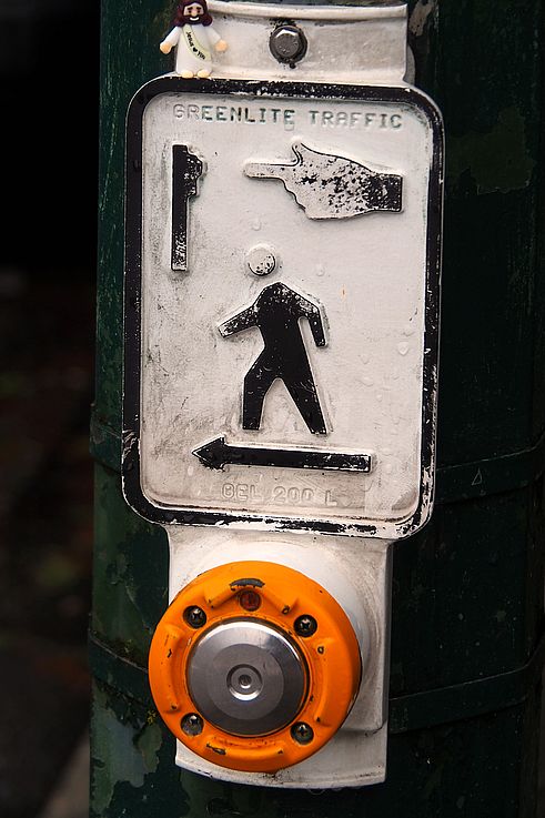 Jesus figurine on a pedestrian push-button in the Gastown district in Vancouver.