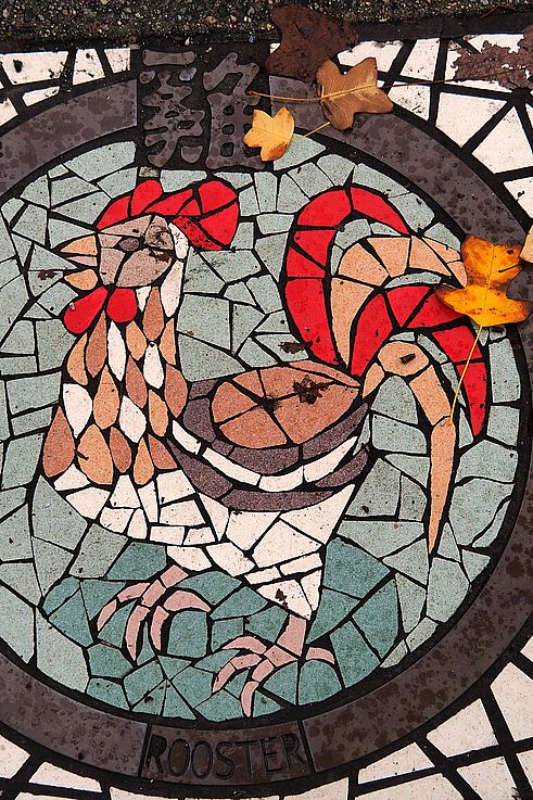 Mosaic representing the Chinese zodiac rooster in the Chinatown district, Vancouver.
