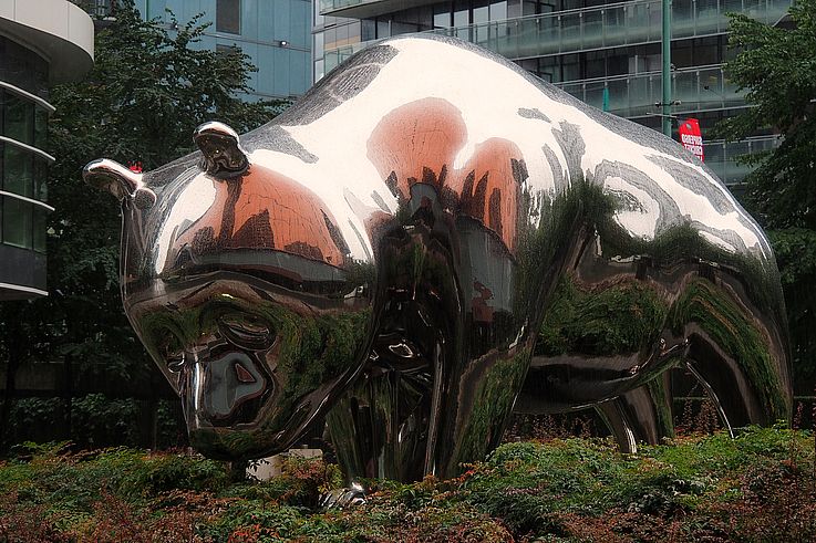 Stainless steel grizzly bear sculpture by artist Chloe Sze in the Yaletown district.