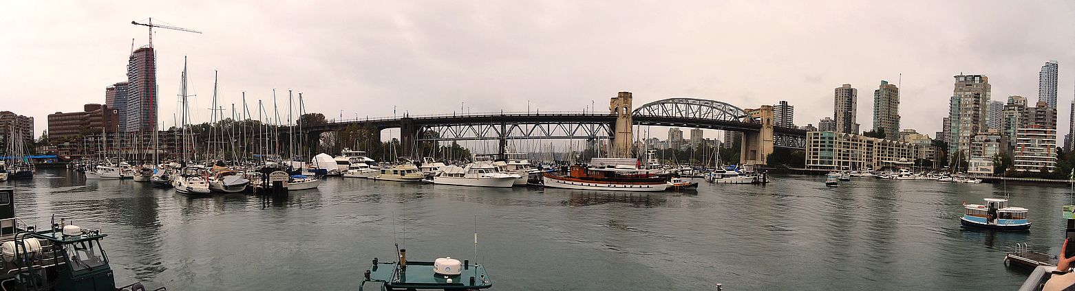 Boats moored at the False Creek marina under the Granville bridge in Vancouver.